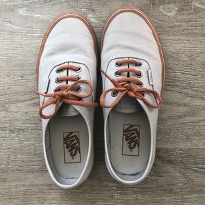 Gray vans with gum bottoms